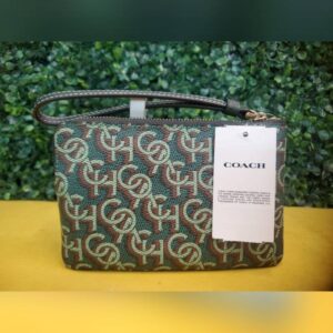 Coach Signature Monogram Wristlet